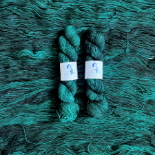 Aqua skein, with variegated black overlay.