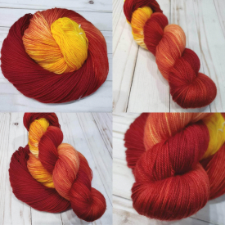 Deep red yarn transitions to deep yellow and back for this variegated yarn.