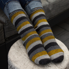 Striped socks have hidden ribs for better fit.