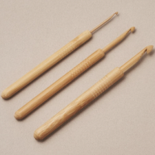 Koshitsu hooks have ergonomic handle and pointy hook, all carved from bamboo. Series of grooves for grip in handle add rich decoration.