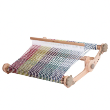 Heddle loom with the warp strung in five colors.