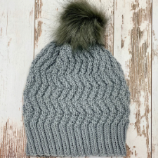 Beanie with sideways chevrons in the body.