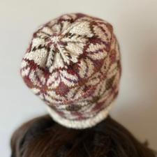 Colorwork beanie with rolled oats motif.