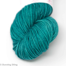 Medium teal semi-solid yarn.