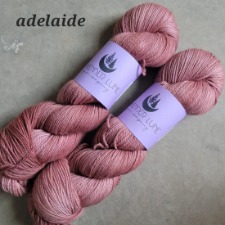 Medium rose tonal yarn in made from organic merino in a worsted spin with just the slightest sheen.