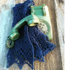 Narrow lace scarf with 1970s rotary phone.