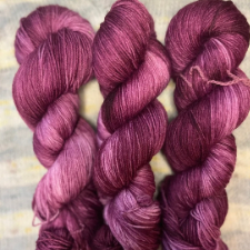Tonal yarn the color of red wine.