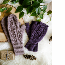Traditional mittens and fingerless mitts with ribbed cuffs and a vine and bobble pattern on the tops.