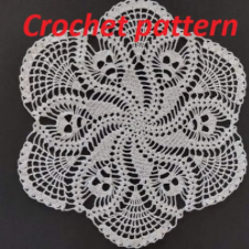 Traditional-style doily with spiderweb and skull motifs.