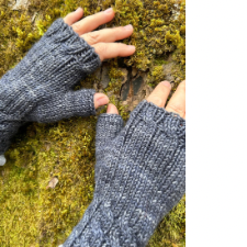Fingerless mitts with cabled cuffs and a hint of a cable near the finger opening. Knitted thumb, too!