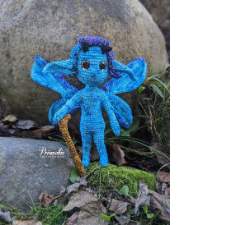 Blue spirit sprite is 9 inches or 23 centimeters tall. It has four wings, floppy, pointy ears, tiny horns and curly bangs. Sprite has a walking staff.