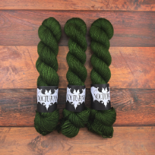 Medium moss green semisolid yarn.