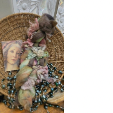 Small image of a Botticelli Madonna, and a roving bundle with curly locks as well as Polwarth and Alpaca fiber. Colors match the art ad are soft browns, pale greens and pale pinks.
