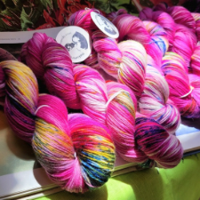 Deep pink and cream ripple sprinkled with cobalt blue,