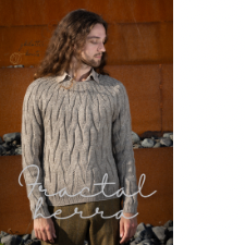 Man wears tan pullover covered in relaxed vertical cables.